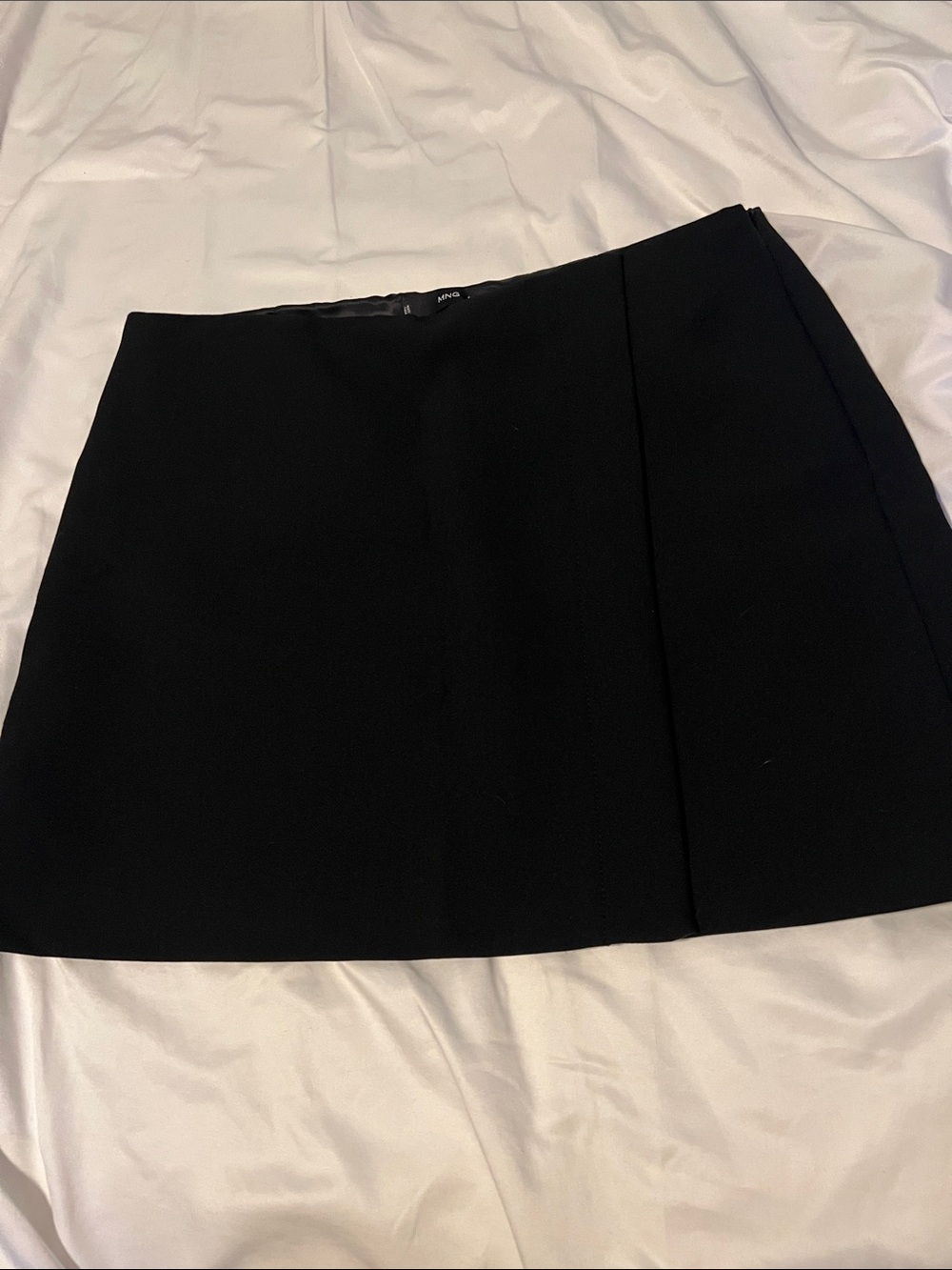 Minimal Black Mini Skirt with Subtle Front Panel